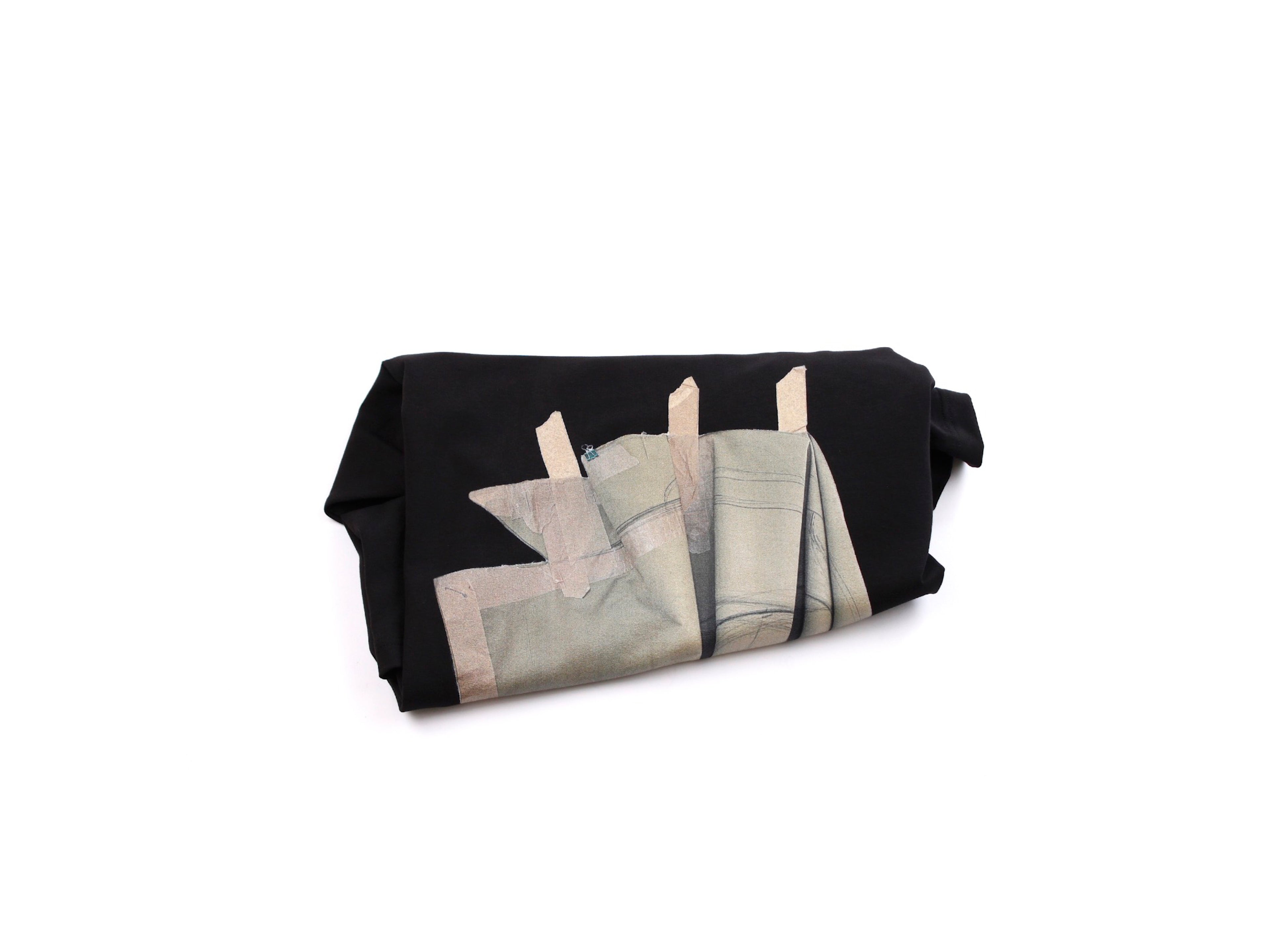 "A Silk Lining with a Seam Undone” black T-shirt